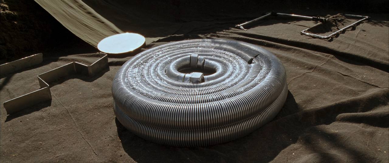 Coiled flexible stainless steel chimney liner ready for installation